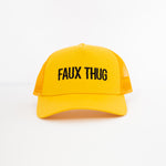 TRUCKER HAT YELLOW | BLACK LOGO