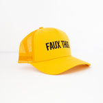 TRUCKER HAT YELLOW | BLACK LOGO